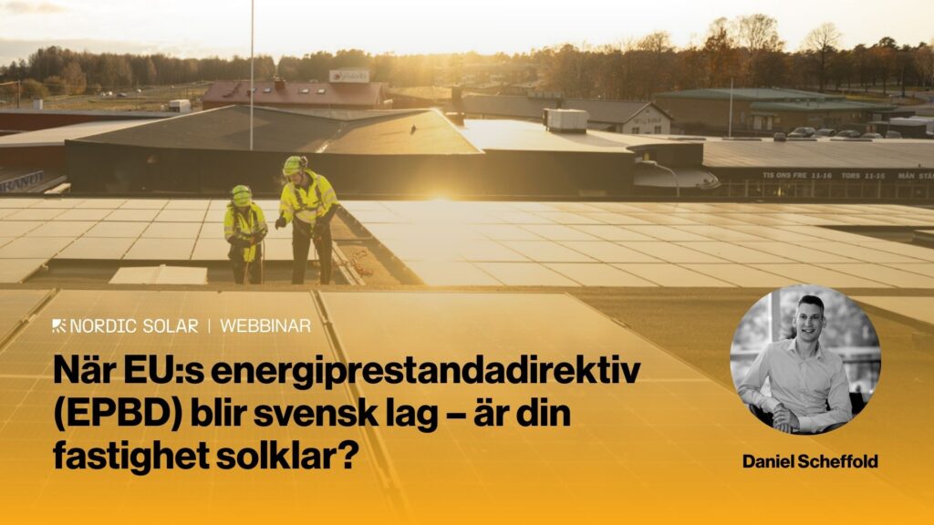 Solceller monterade på taket av en kommersiell fastighet för att möta kraven i EU:s energiprestandadirektiv EPBD.